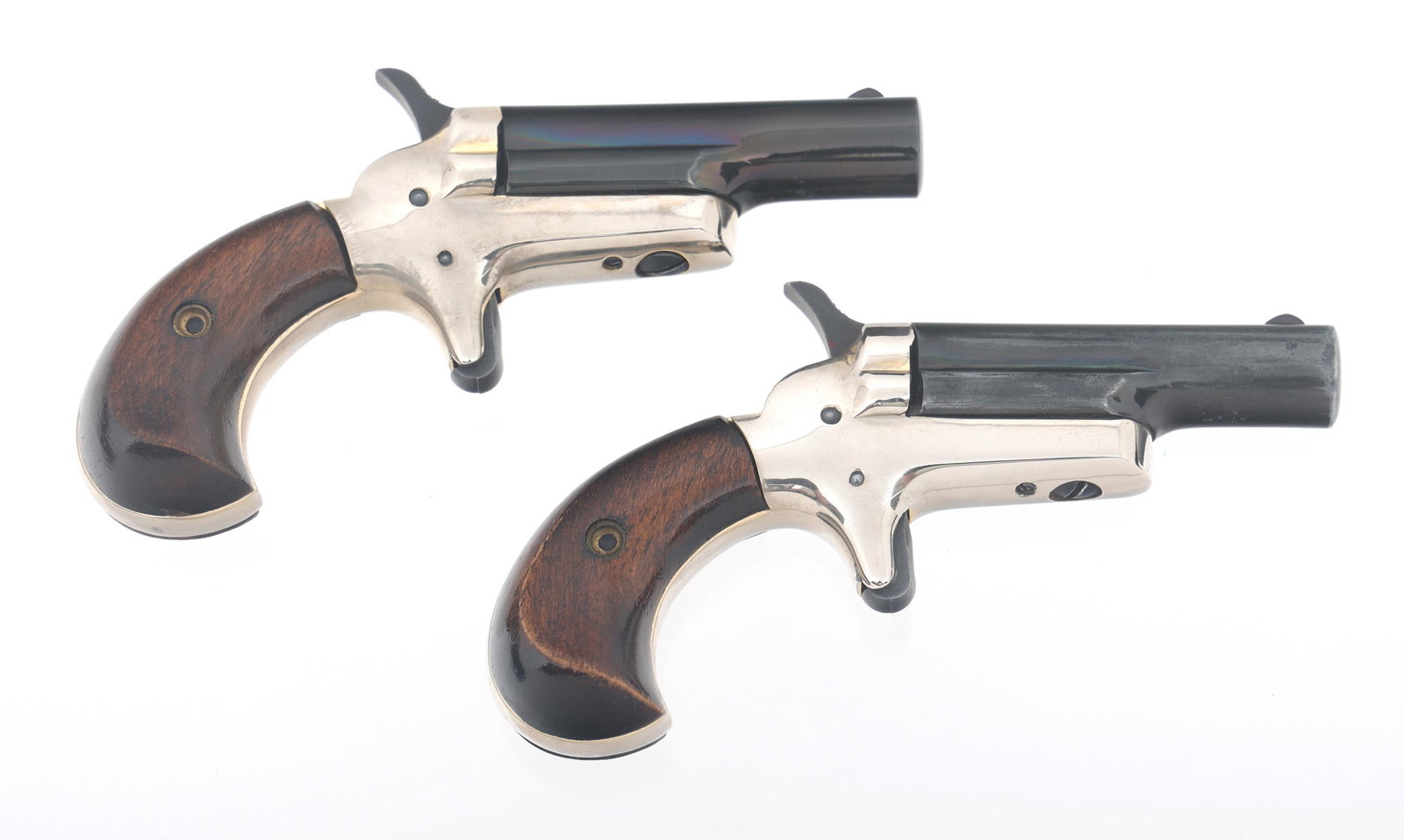 COLT LORD AND LADY .22 S CAL DERRINGER PAIR: COLT LORD AND LADY .22 S CAL DERRINGER PAIR Colt Lord and Lady pair of .22 Short caliber derringers. Barrel stamped 22 CAL. Short Colt's P.F.A. MFG. Co. Inc. HTFD. Ct. U.S.A. Consecutive serial number