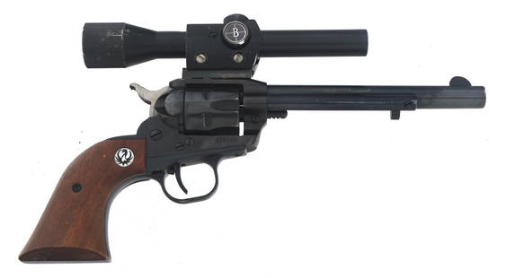 RUGER MODEL SINGLE SIX .22 CALIBER SA REVOLVER: RUGER MODEL SINGLE SIX .22 CALIBER SA REVOLVER 1963 Ruger Model Single Six .22 caliber Single action revolver. Blued finish. Wood grips with Ruger medallion. Missing rear sight. Two fluted cylinders.
