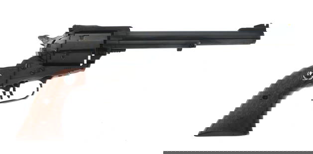 RUGER SUPER BLACKHAWK .44 MAG CALIBER REVOLVER: RUGER SUPER BLACKHAWK .44 MAG CALIBER REVOLVER 1961 Ruger Super Blackhawk .44 Magnum caliber single action revolver. Blued finish. Wood grips with Ruger Medallion. Adjustable rear sight. Front sight h