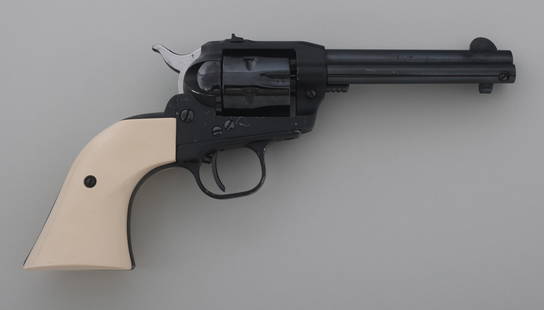 RUGER MODEL SINGLE SIX .22 CALIBER SA REVOLVER: RUGER MODEL SINGLE SIX .22 CALIBER SA REVOLVER 1957 Ruger Model Single Six .22 caliber single action revolver. Light weight frame. Blued finish. Composite grips. Fixed sights. Six shot fluted cylinder