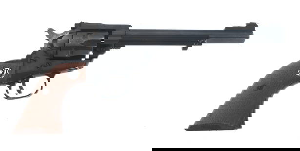 RUGER MODEL SINGLE SIX .22 LR CALIBER SA REVOLVER: RUGER MODEL SINGLE SIX .22 LR CALIBER SA REVOLVER Ruger Model Single Six .22 LR caliber Single action revolver. Blued finish. Wood grips with Ruger Medallion. Adjustable rear sight. Six shot fluted cy