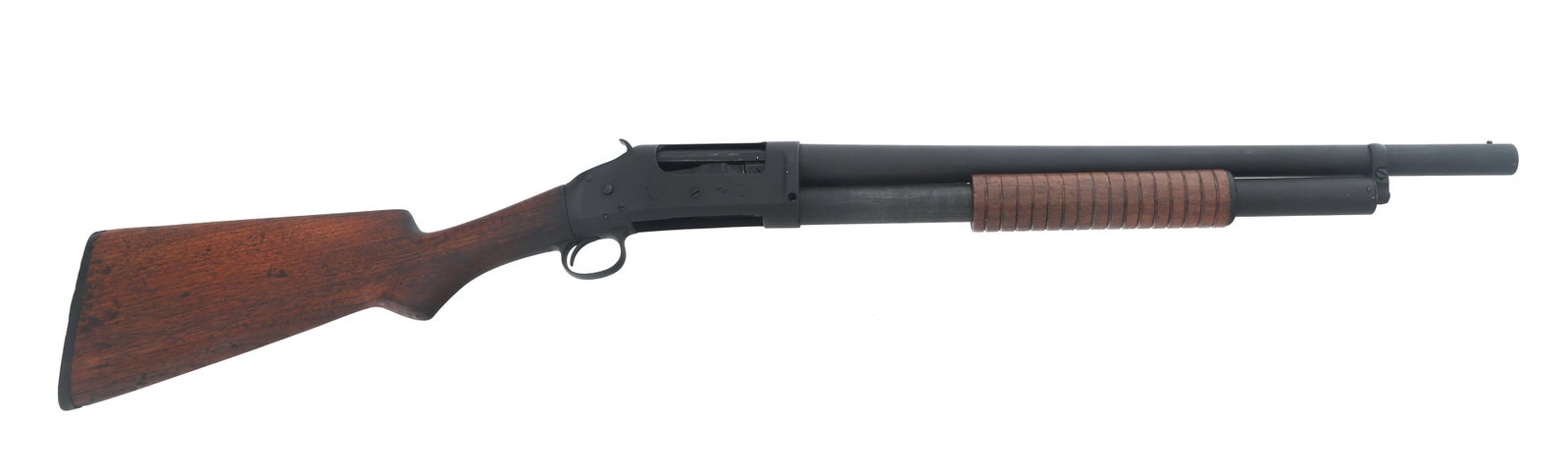 WINCHESTER MODEL 1897 12 GAUGE PUMP ACTION SHOTGUN: WINCHESTER MODEL 1897 12 GAUGE PUMP ACTION SHOTGUN 1900 Winchester Model 1897 12 gauge pump action shotgun. Barrel has fixed Improved Cylinder choke. Carved into left side of stock RAD. Matte black fi