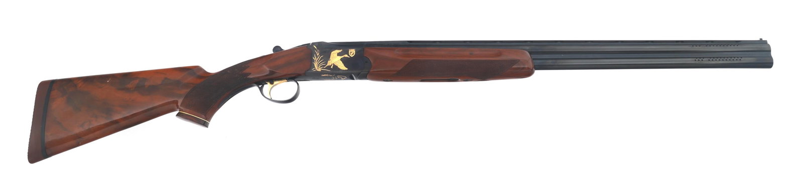 WEATHERBY DUCKS UNLIMITED ORION 20 GA SHOTGUN: WEATHERBY DUCKS UNLIMITED ORION 20 GA SHOTGUN Weatherby Ducks Unlimited 50th Anniversary Model Orion 20 gauge Over Under shotgun. Barrel rib stamped Ducks Unlimited. Engraved receiver. Bottom of recei