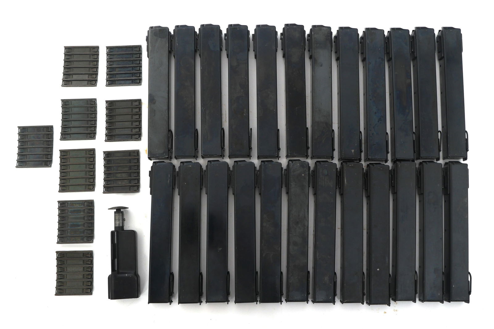 SUOMI KP-31 9mm MACHINE GUN 36 ROUND MAGAZINES: SUOMI KP-31 9mm MACHINE GUN 36 ROUND MAGAZINES Suomi KP-31 9mm 36 round machine gun stick magazines. Lot of 24. Magazine loader. Caliber / Gauge: 9mm