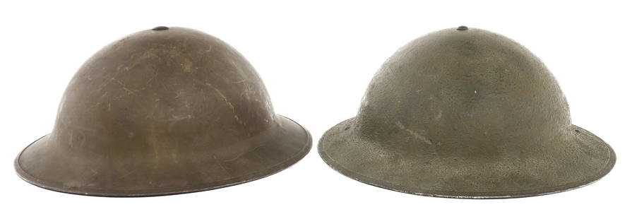 WWII US M1917A1 & BRITISH MKII COMBAT HELMETS: WWII US M1917A1 & BRITISH MKII COMBAT HELMETS WWII US M1917A1 "Kelley" and British MkII Combat Helmets. (1) US M1917A1. Lot number 17A stamped on the brim. Complete liner with chinstrap. (1) British M