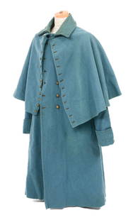 CIVIL WAR US ENLISTED M1858 SKY BLUE GREATCOAT: CIVIL WAR US ENLISTED M1858 SKY BLUE GREATCOAT Civil War US Army Enlisted Cavalry or Artillery M1858 Greatcoat. Double breasted, sky blue wool construction with unlined and sewn on cape. 1850s pattern
