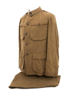 PRE-WWI M1904 US ARMY SERVICE UNIFORM: PRE-WWI M1904 US ARMY SERVICE UNIFORM M1904 US Army Service Uniform. (1) Service Tunic. Wool construction with US Eagle buttons. Maker marked by Minneapolis Costume Company. "Co M 30" stamped on the i