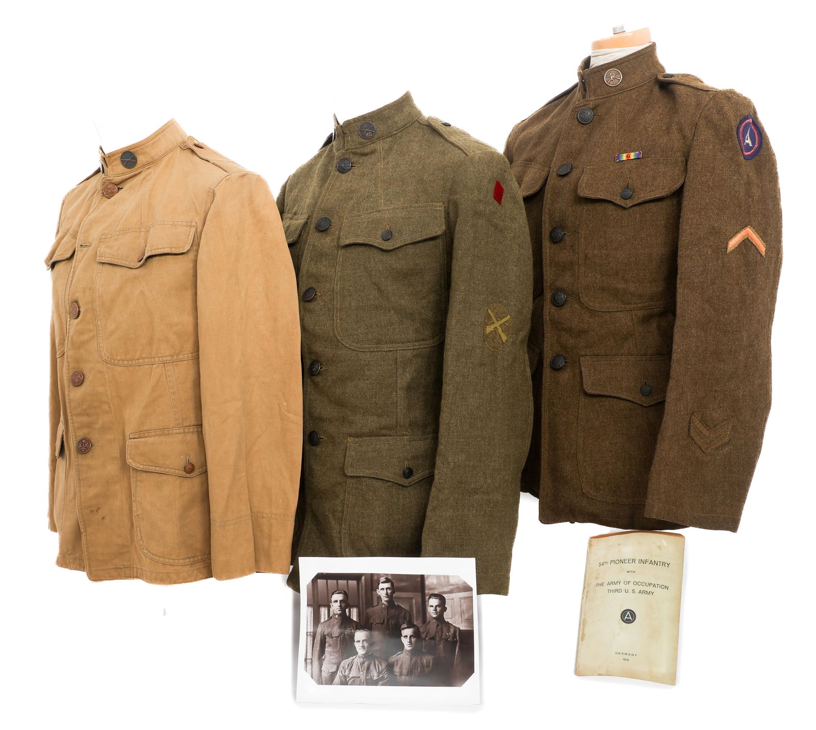 WWI US ARMY M1912 SUMMER & M1917 SERVICE TUNICS: WWI US ARMY M1912 SUMMER & M1917 SERVICE TUNICS WWI US Army M1912 and M1917 Tunics. (1) Corporal M1917 Tunic. Depot tag present. 3rd Army shoulder patch. Corporal rank with service and discharge strip