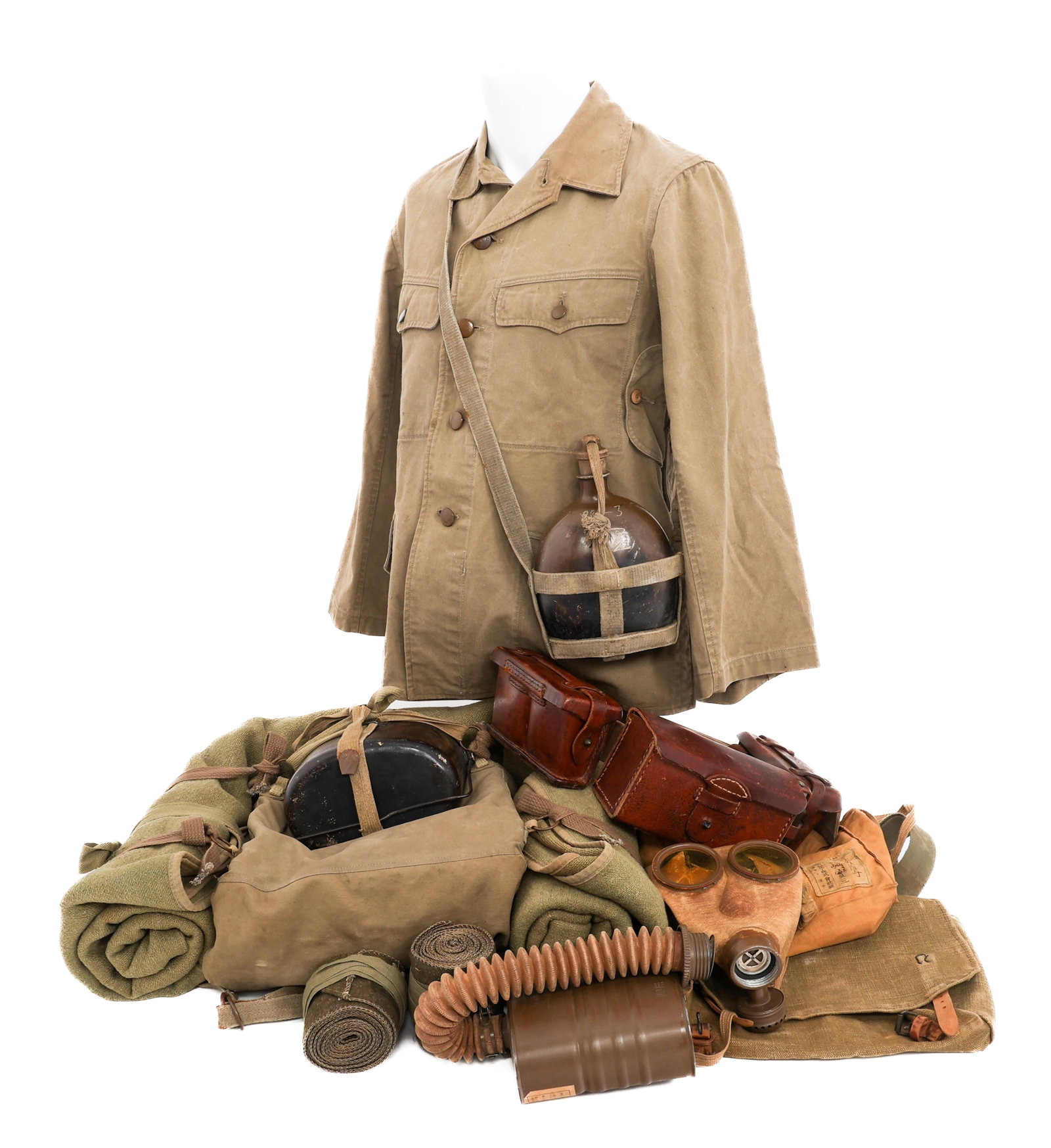 WWII JAPANESE ENLISTED SOLDIER UNIFORM & GEAR SET: WWII JAPANESE ENLISTED SOLDIER UNIFORM & GEAR SET WWII Imperial Japanese Army Enlisted Soldier Uniform and Field Gear Set. (1) Summer Type 98 Uniform. Khaki cotton tunic Painted steel buttons. Ink sta