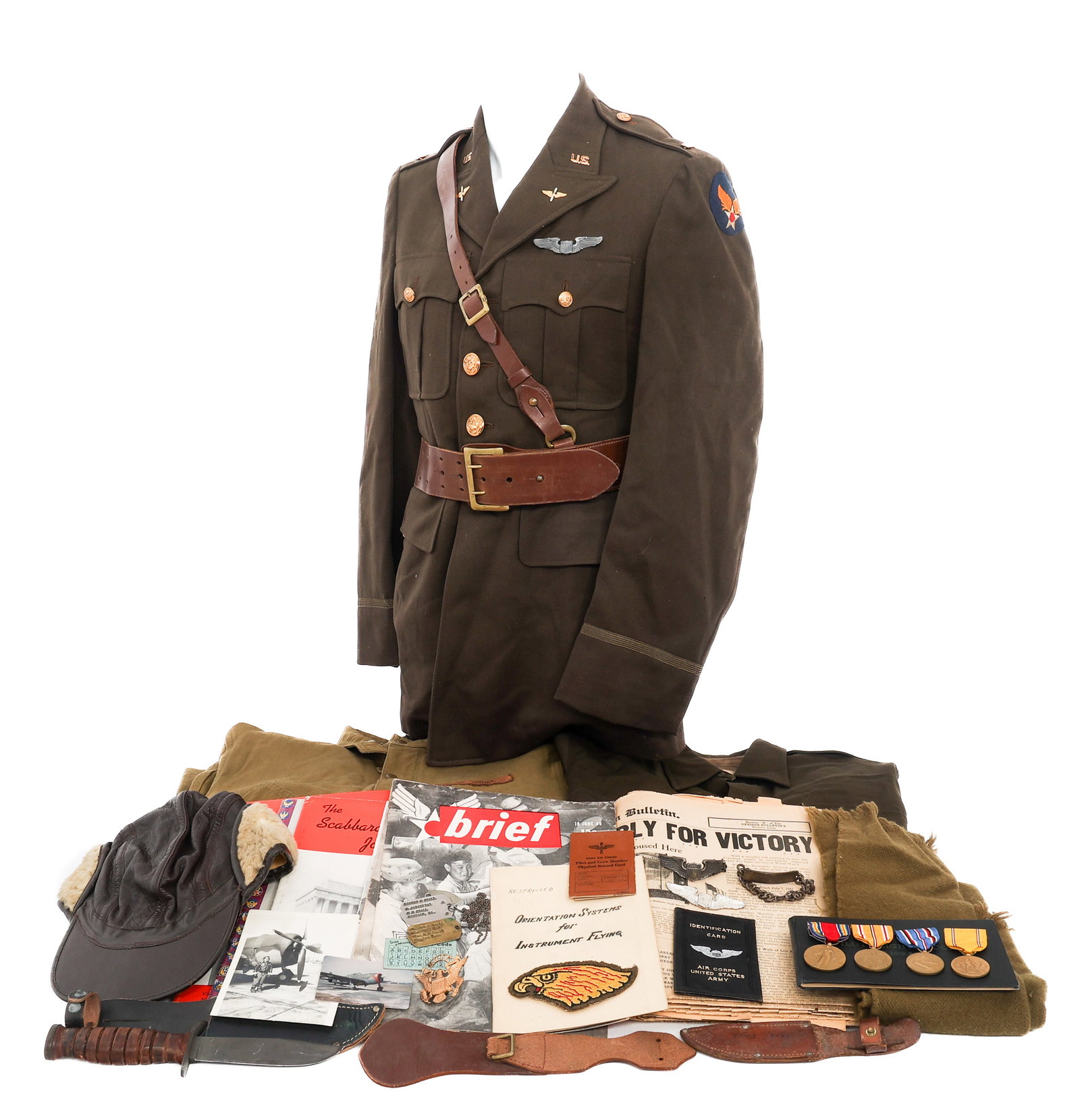 WWII USAAF P-47 FIGHTER PILOT NAMED UNIFORM GROUP: WWII USAAF P-47 FIGHTER PILOT NAMED UNIFORM GROUP WWWII USAAF P-47 Fighter Pilot Uniform & Insignia Grouping. Named to 2nd Lieutenant Robert C. Ewall 0-407937. (1) Type A-4 Flight Suit named to Ewall.
