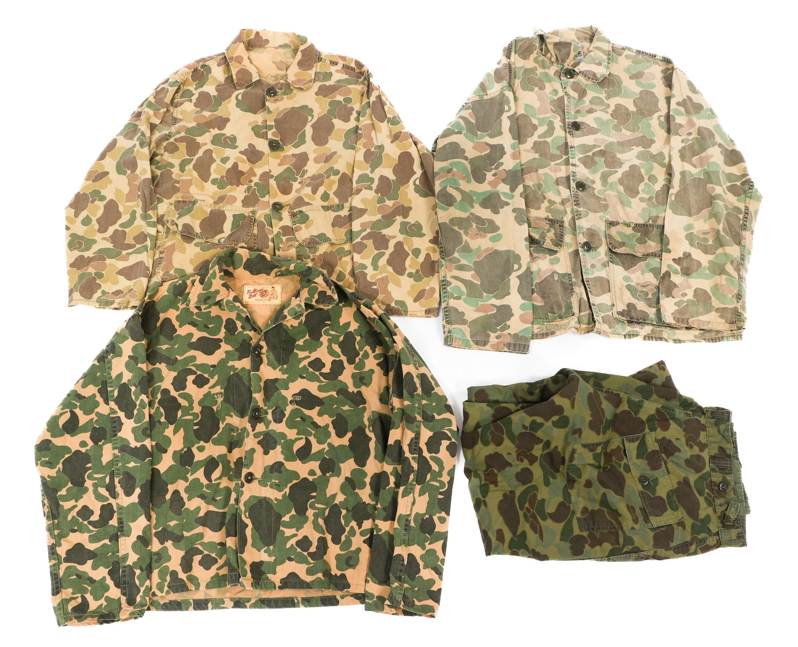VIETNAM WAR SOUTH VIETNAMESE BEO GAM UNIFORMS: VIETNAM WAR SOUTH VIETNAMESE BEO GAM UNIFORMS Vietnam War South Vietnamese Beo Gam Camouflage Uniforms. (3) Jackets. Reversible Beo Gam camouflage pattern, cotton construction. Two with maker tags by 