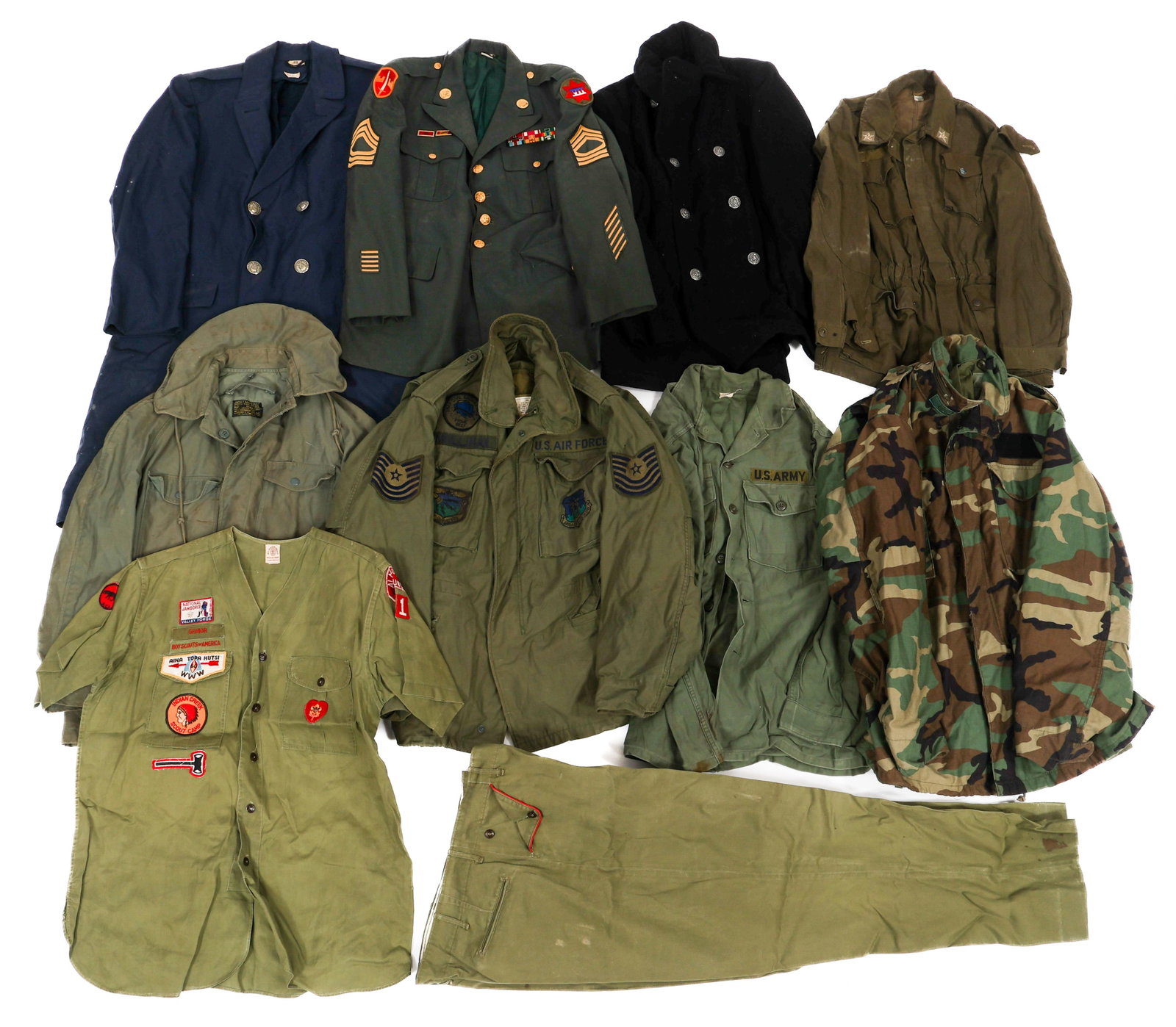 COLD WAR US, ITALIAN, & BOY SCOUT UNIFORM ITEMS: COLD WAR US, ITALIAN, & BOY SCOUT UNIFORM ITEMS Cold War US Armed Forces, Italian, and Boy Scout Uniform Items. Includes field jackets, woodland camouflage jacket, overcoats, service tunic, Boy Scouts