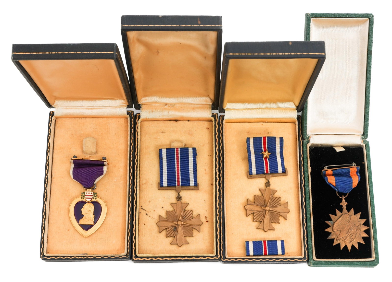 WWII - COLD WAR NAMED PURPLE HEART & MEDALS: WWII - COLD WAR NAMED PURPLE HEART & MEDALS WWII - Cold War Named Purple Heart and Medals. (1) Named Purple Heart. Named to James D Peters USNR on the reverse. Original box. (1) Air Medal. Replacement