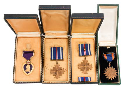WWII - COLD WAR NAMED PURPLE HEART & MEDALS: WWII - COLD WAR NAMED PURPLE HEART & MEDALS WWII - Cold War Named Purple Heart and Medals. (1) Named Purple Heart. Named to James D Peters USNR on the reverse. Original box. (1) Air Medal. Replacement