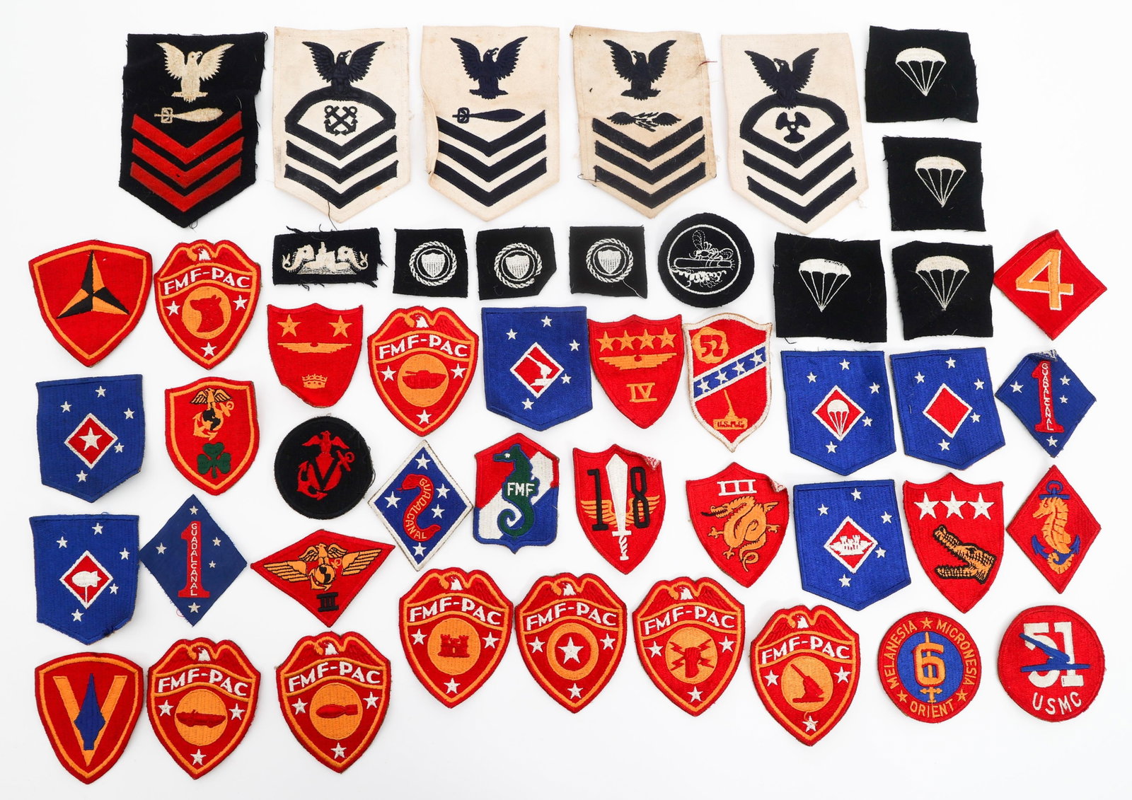 WWII US MARINE CORPS & NAVY PATCHES: WWII US MARINE CORPS & NAVY PATCHES WWII US Marine Corps & Navy Patches. Includes BEVO 1st Marine Division, 1st MAC patches, Marine Air Wing, Marine Detachment Londonderry, FMF-PAC, US Navy parachute 