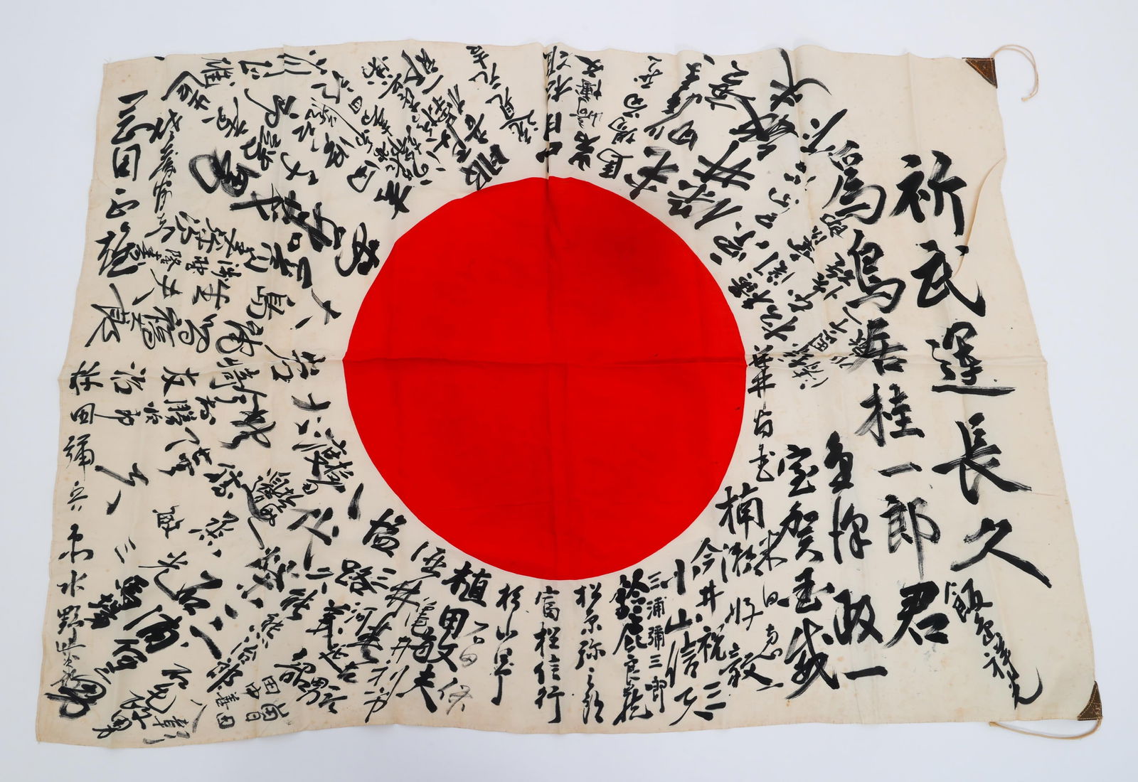 WWII IMPERIAL JAPANESE YOSEGAKI HINOMARU FLAG: WWII IMPERIAL JAPANESE YOSEGAKI HINOMARU FLAG WWII Imperial Japanese Yosegaki Hinomaru Flag. Double sided, single-piece silk construction with printed emblem and handwritten kanji characters. Reinforc