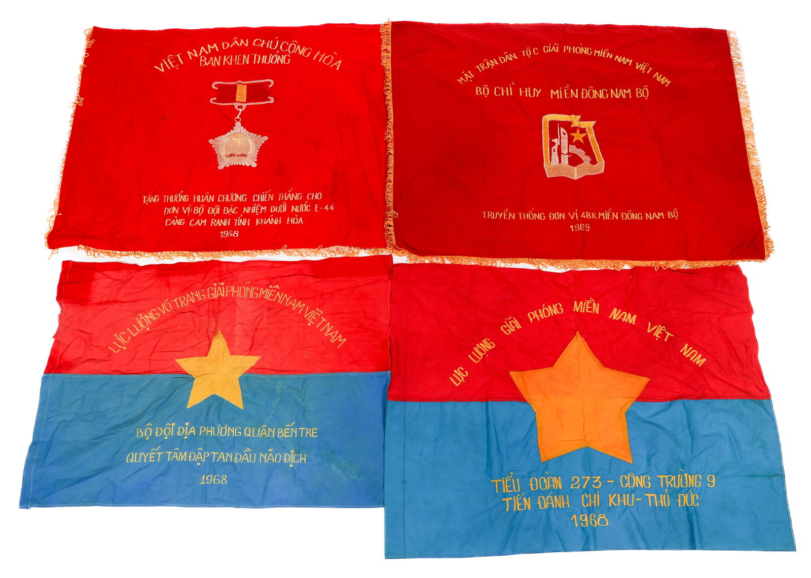 POST VIETNAM WAR SAIGON MARKET NVA FLAGS: POST VIETNAM WAR SAIGON MARKET NVA FLAGS Four Post Vietnam War Saigon Market NVA & Viet Cong Flags. Size: 24" to 29" x 36" to 42".