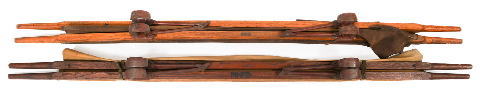 WWI US ARMED FORCES STRETCHERS: WWI US ARMED FORCES STRETCHERS WWI US Armed Forces Stretchers. One with maker tag of "Gold Medal" Folding Furniture Co. Wooden and canvas construction. Size: 90" x 7" x 4"