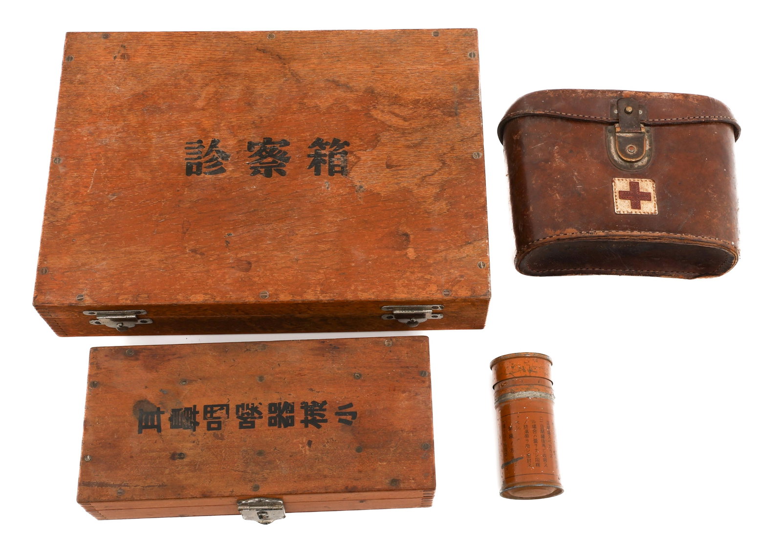 WWII IMPERIAL JAPANESE MEDIC POUCH & SURGICAL KIT: WWII IMPERIAL JAPANESE MEDIC POUCH & SURGICAL KIT WWII Imperial Japanese Medic Pouch & Field Surgery Kit. (1) Leather Medic Pouch with red cross insignia on the front. Kanji markings on the lid. No co