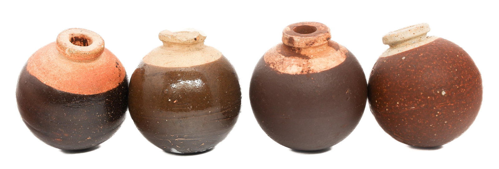 WWII IMPERIAL JAPANESE TYPE 4 CERAMIC GRENADES: WWII IMPERIAL JAPANESE TYPE 4 CERAMIC GRENADES Four WWII Imperial Japanese Type 4 Ceramic Grenades. All are painted brown.