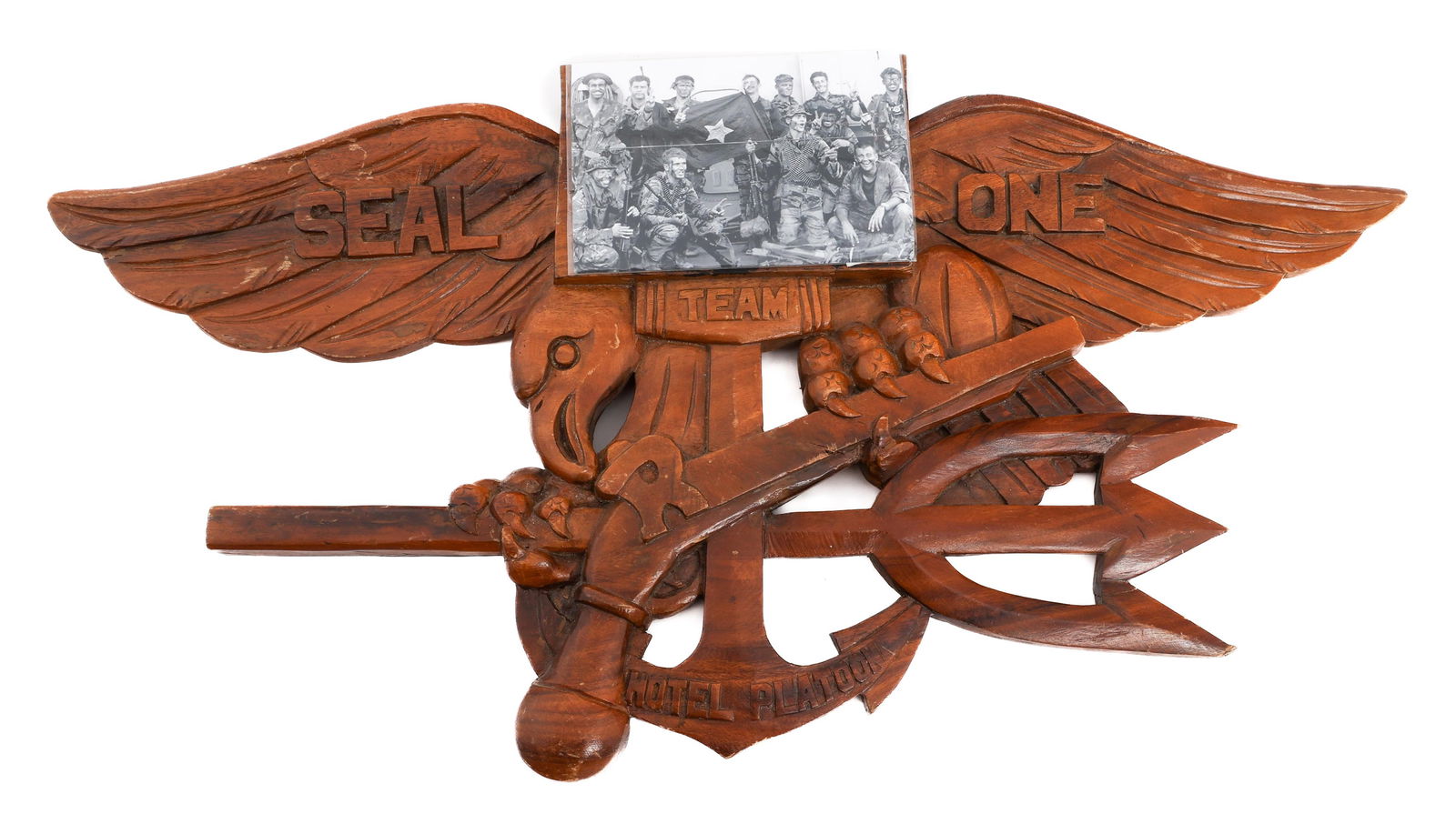VIETNAM WAR US NAVY SEAL TEAM ONE WALL PLAQUE: VIETNAM WAR US NAVY SEAL TEAM ONE WALL PLAQUE Vietnam War US Navy SEAL Team One Hotel Platoon Commemorative Wood Wall Plaque. Special Warfare Insignia design with photograph of SEALs with captured NVA