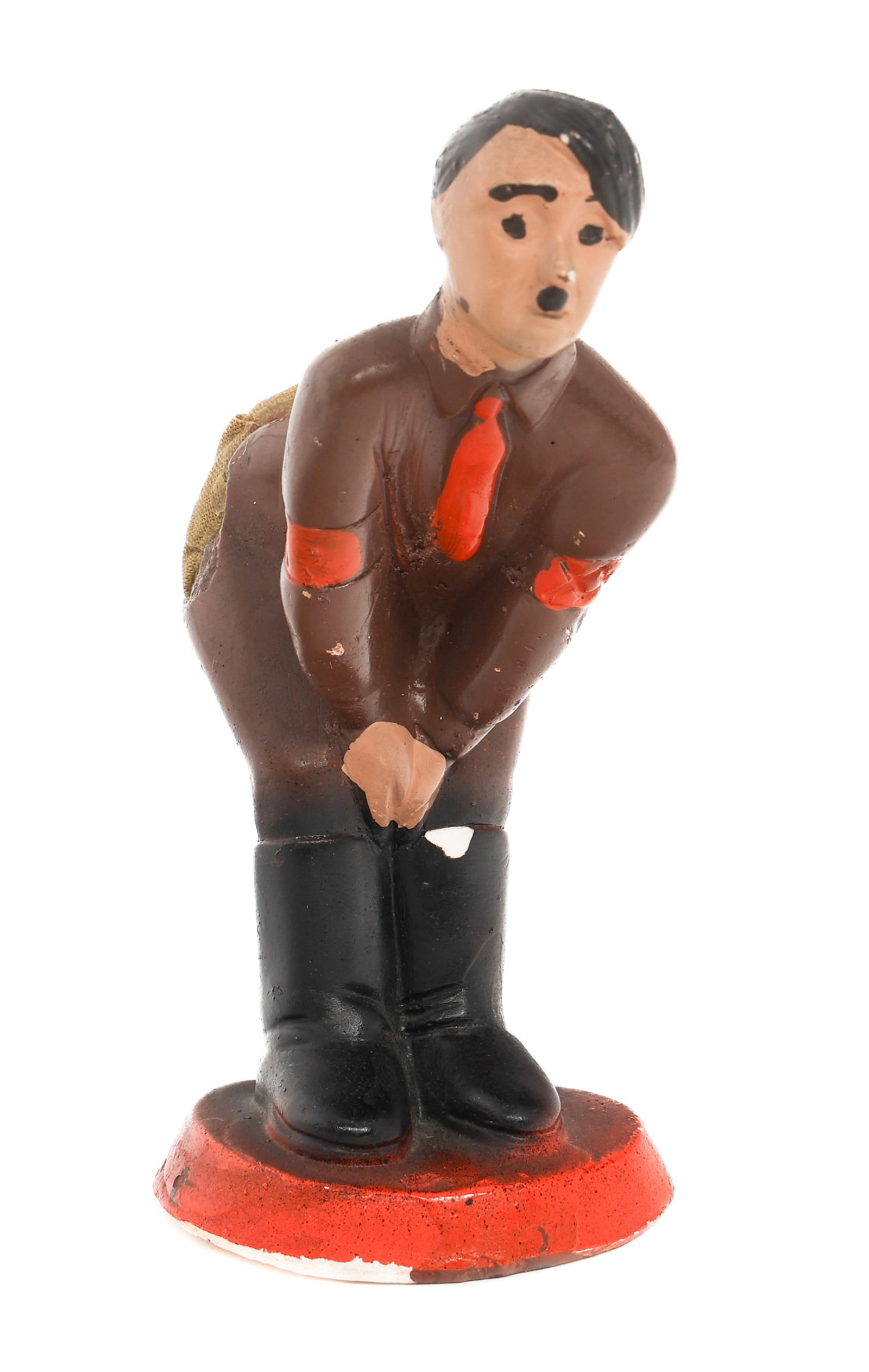 WWII ANTI-HITLER PINCUSHION FIGURINE: WWII ANTI-HITLER PINCUSHION FIGURINE WWII Anti Hitler Propaganda Pincushion Figurine. Painted plaster construction. Maker marked and dated 1941 near the bottom. Size: 4 1/2" x 3 1/4" x 2"