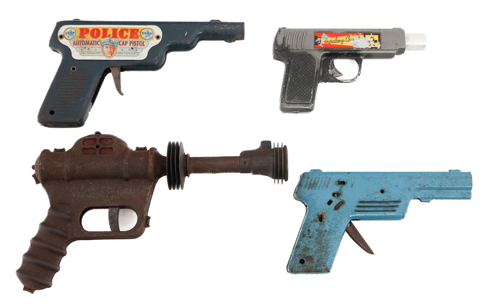 VINTAGE TOY PISTOLS: VINTAGE TOY PISTOLS Vintage Toy Pistols. Includes Daisy Buck Rogers Automatic Pistol, Hopalong Cassidy Auto-Magic, Bell Pistol, and Police Automatic Cap Pistol. Metal construction.