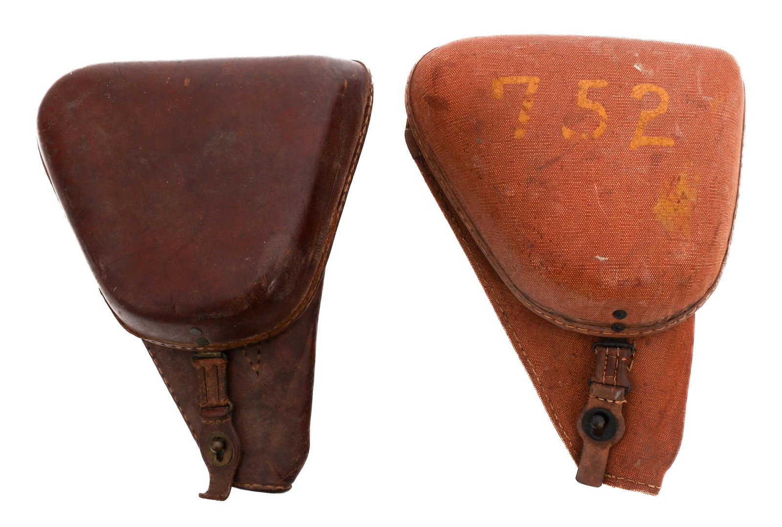 WWII JAPANESE NAMBU TYPE 14 PISTOL HOLSTERS: WWII JAPANESE NAMBU TYPE 14 PISTOL HOLSTERS WWII Japanese Nambu Type 14 Pistol Holsters. (1) Brown Leather Type 14. Kanji stamps present on the inside. Includes cleaning rod. (1) Rubberized Canvas Typ