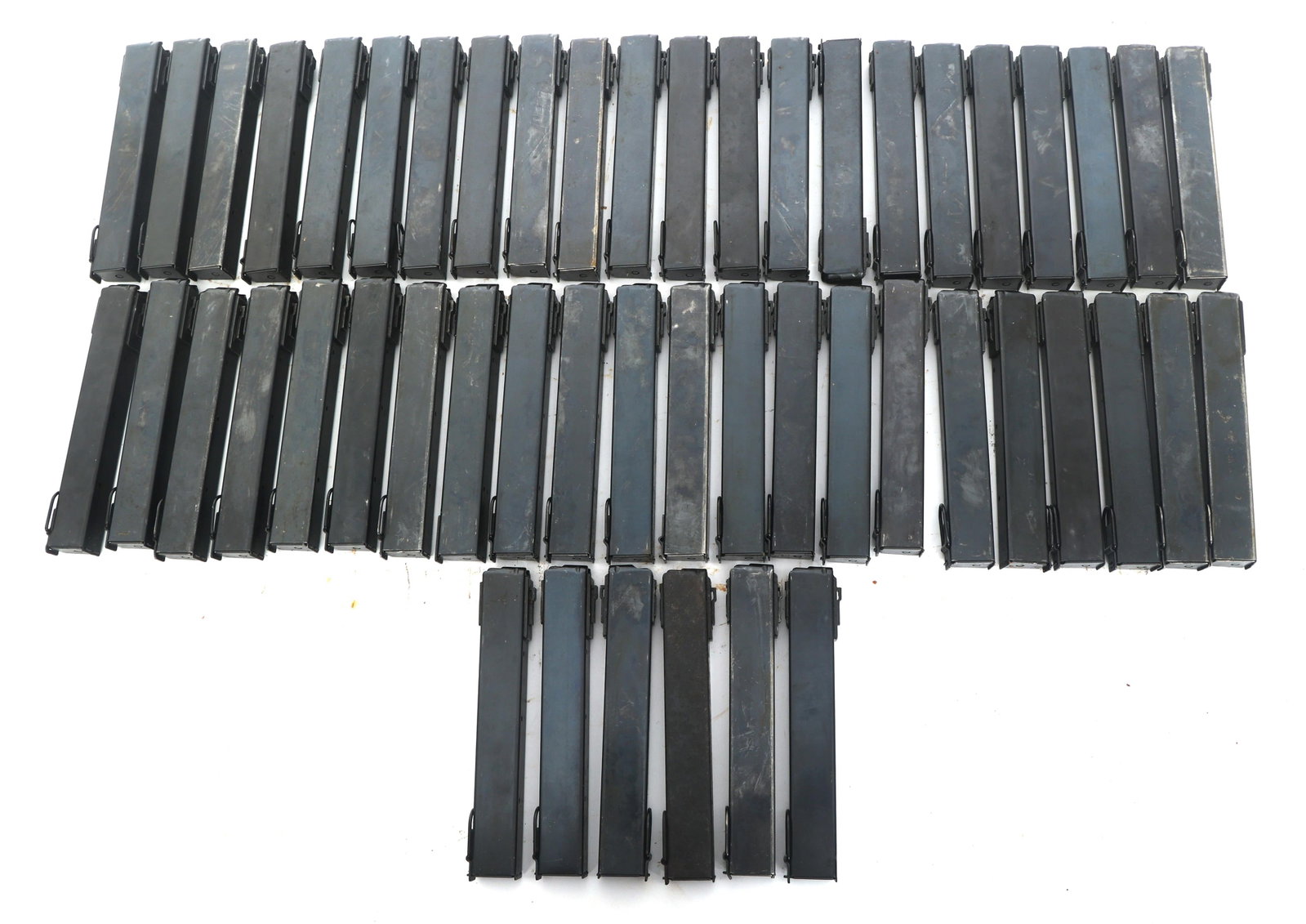 FINNISH KP-31 9x19mm CALIBER MACHINE GUN MAGAZINES: FINNISH KP-31 9x19mm CALIBER MACHINE GUN MAGAZINES Fifty Finnish 9x19mm caliber KP-31 Suomi machine gun magazines. Caliber / Gauge 9x19mm