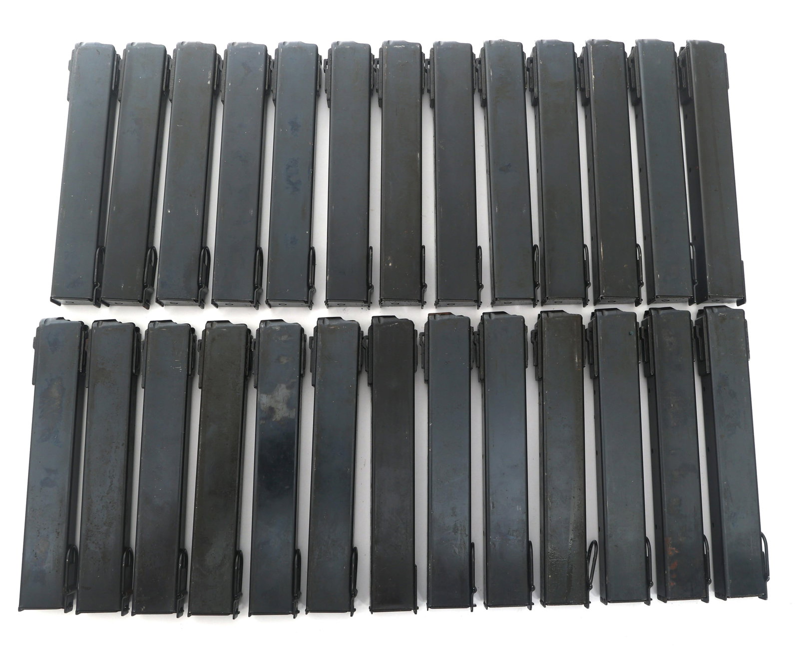 FINNISH KP-31 9x19mm CALIBER MACHINE GUN MAGAZINES: FINNISH KP-31 9x19mm CALIBER MACHINE GUN MAGAZINES Twenty-six Finnish Model 9x19mm KP-31 Suomi caliber machine gun magazines. Caliber / Gauge 9x19mm