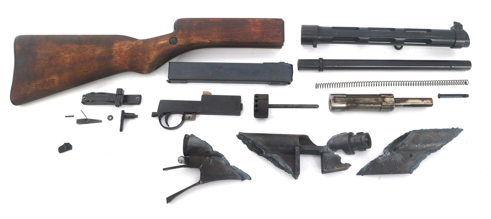 FINNISH KP-31 9x19mm CALIBER MACHINE GUN PARTS KIT: FINNISH KP-31 9x19mm CALIBER MACHINE GUN PARTS KIT Finnish KP-31 9x19mm caliber machine gun parts kit. Cut receiver sections. Charging handle cut through. Bolt, trigger assembly, recoil assembly. Barr