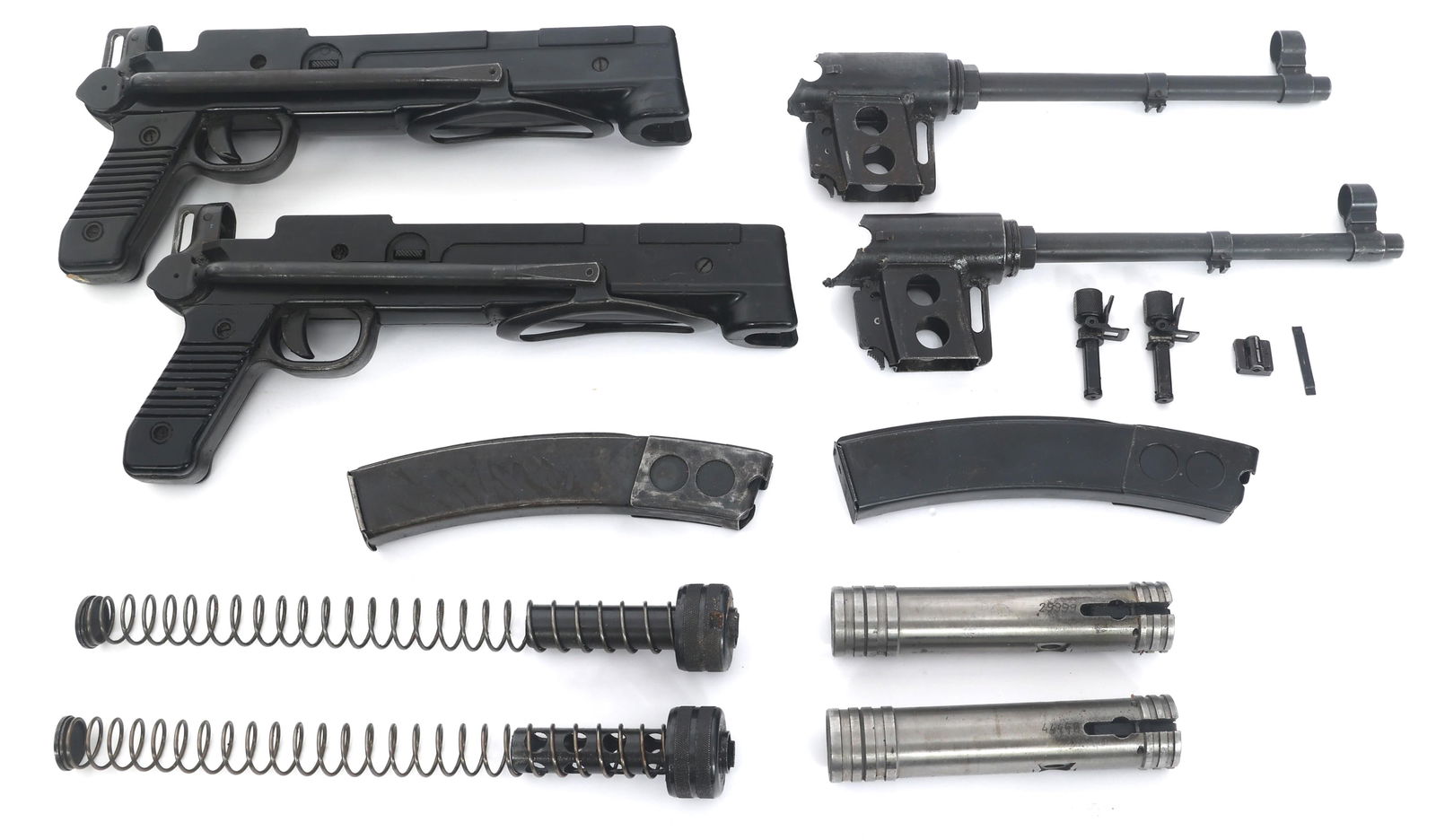 YUGOSLAVIAN M56 7.62mm CAL MACHINE GUN PARTS KITS: YUGOSLAVIAN M56 7.62mm CAL MACHINE GUN PARTS KITS Two Yugoslavian M56 7.62x25mm caliber machine gun parts kits. Two composite lower receiver with folding stocks. Two bolts. Two barrel assemblies with