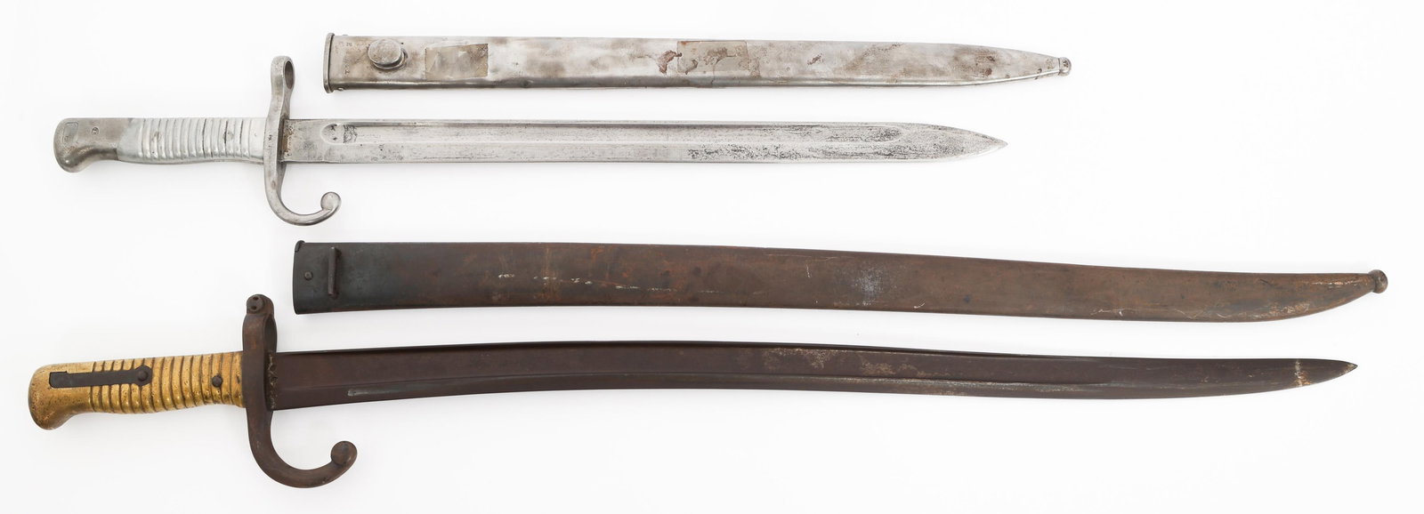FRENCH M1866 & ARGENTINE M1891 BAYONETS: FRENCH M1866 & ARGENTINE M1891 BAYONETS French M1866 & Argentine M1891 Bayonets. (1) French M1866. Single edged, yataghan blade with fuller. Maker marked by Manufacture Imp?riale de St-?tienne and dat