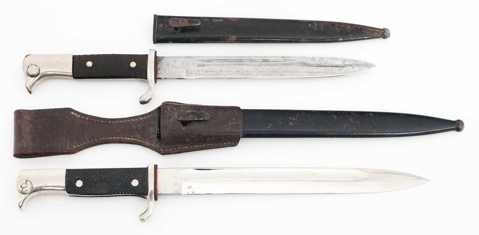 WWII GERMAN K98 DRESS BAYONETS by ERNST PACK: WWII GERMAN K98 DRESS BAYONETS by ERNST PACK WWII German K98 Dress & Modified Bayonets. (1) K98. Single edged, bright blade. Maker marked by E. Pack and Sohne. Leather buffer pad present. Nickel-silve