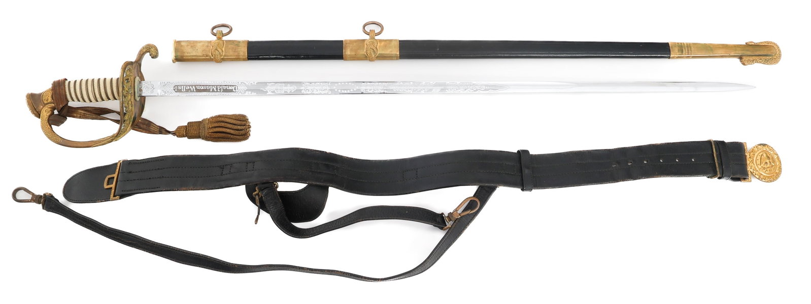 US NAVY M1852 NAMED OFFICER SWORD by E&F HORSTER: US NAVY M1852 NAMED OFFICER SWORD by E&F HORSTER US Navy M1852 Officer Sword and Belt. Named to Donald Mason Wells. Single edged, bright blade with fuller. Triple acid etched blade with floral and nav