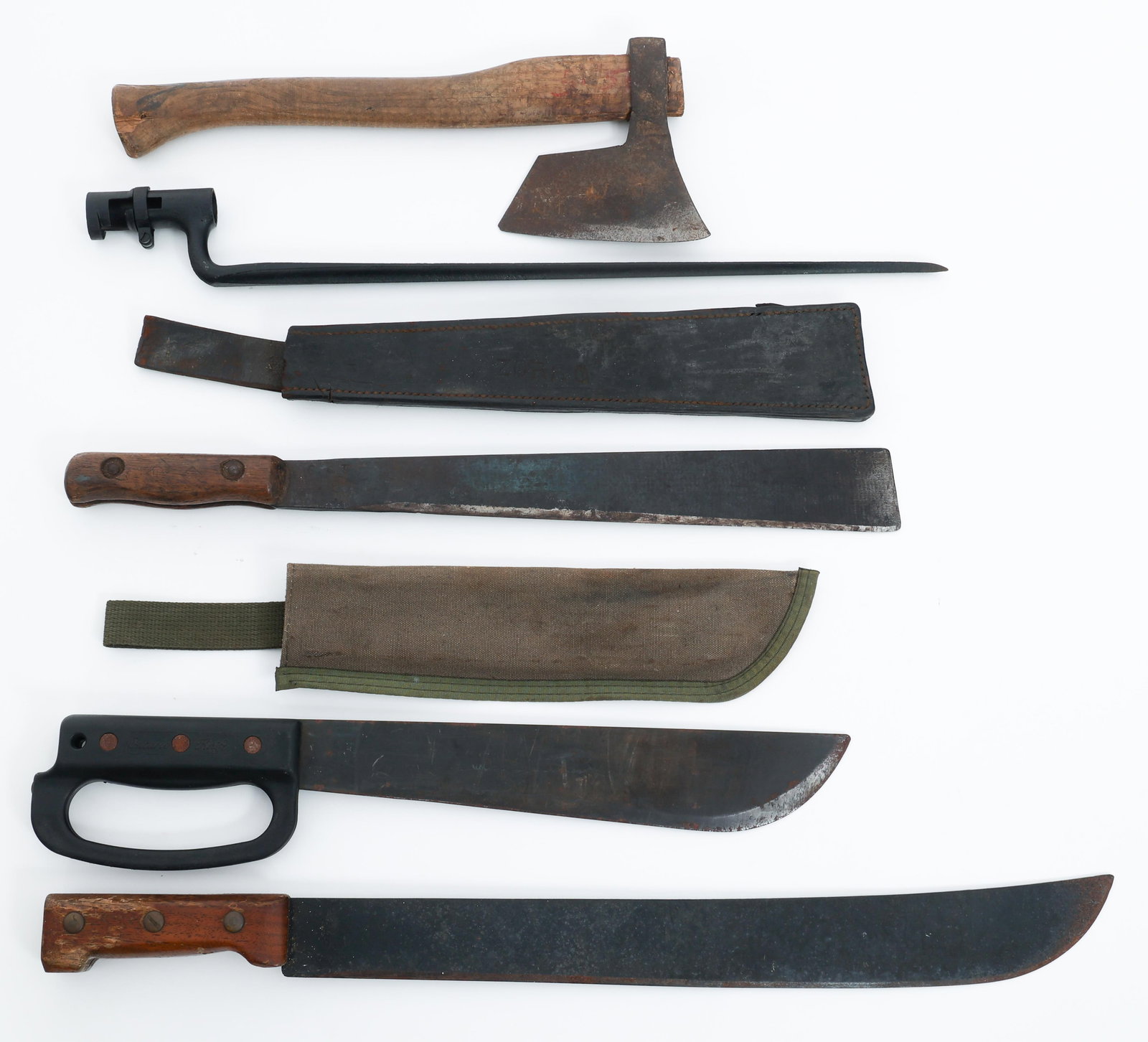 US & BRITISH MACHETES, AXE & SOCKET BAYONET: US & BRITISH MACHETES, AXE & SOCKET BAYONET US and British Machetes, Axe and Socket Bayonet. (1) Ontario Field Machete. Canvas sheath. (1) US M1873 Socket Bayonet. No scabbard. (1) Made in England mar