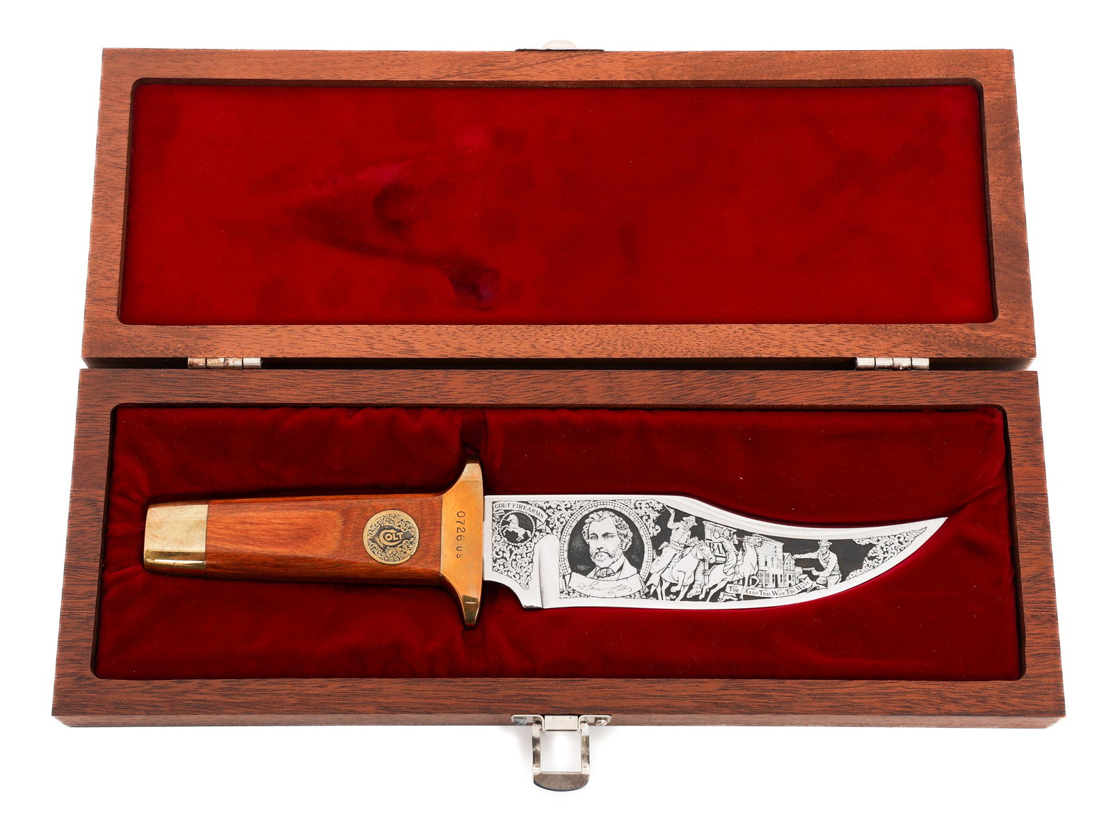 AURUM ETCHED SAMUEL COLT COLLECTOR BOWIE KNIFE: AURUM ETCHED SAMUEL COLT COLLECTOR BOWIE KNIFE Aurum Etched Samuel Colt Collector Bowie Knife. Single edged, bright bowie blade. Aurum etching of Samuel Colt and western scene. Serial numbered 0726. B