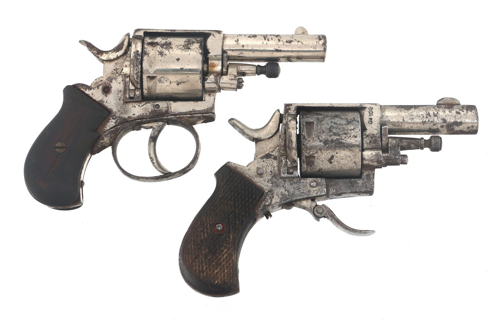 BELGIAN .32 CALIBER REVOLVERS: BELGIAN .32 CALIBER REVOLVERS Two Belgian .32 caliber revolvers. A) Belgian .32 caliber folding trigger revolver. Nickel plated. Checkered wood grips. Six shot smooth cylinder. B) Belgian .32 caliber