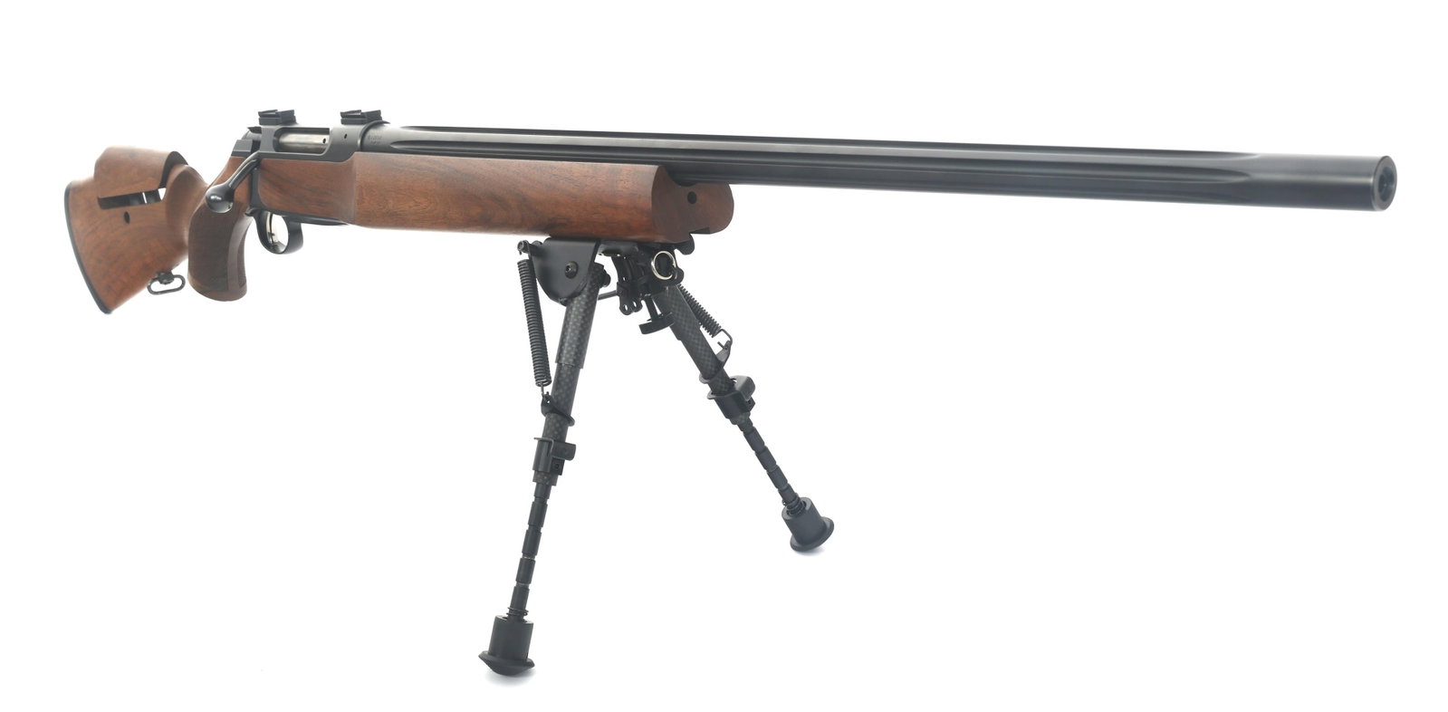 SAUER MODEL 202 .243 CALIBER TARGET RIFLE RIFLE: SAUER MODEL 202 .243 CALIBER TARGET RIFLE RIFLE Sauer Model 202 .243 Win caliber bolt action rifle. Blued finish. Fluted barrel. Wood stock with adjustable cheek riser. One magazine. Bipod. Hard case.
