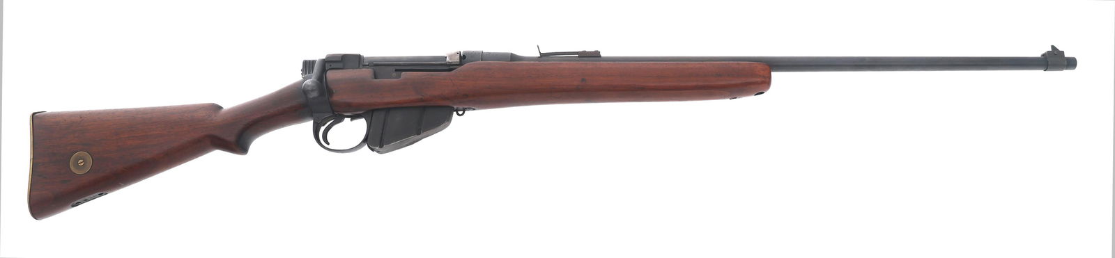 SPORTERIZED 1924 ENFIELD Sht.LE 303 CALIBER RIFLE: SPORTERIZED 1924 ENFIELD Sht.LE 303 CALIBER RIFLE Sporterized 1924 Enfield Model Sht.LE .303 British caliber bolt action rifle. No import marks. Blued finish. Blade front sight. Adjustable rear sight.