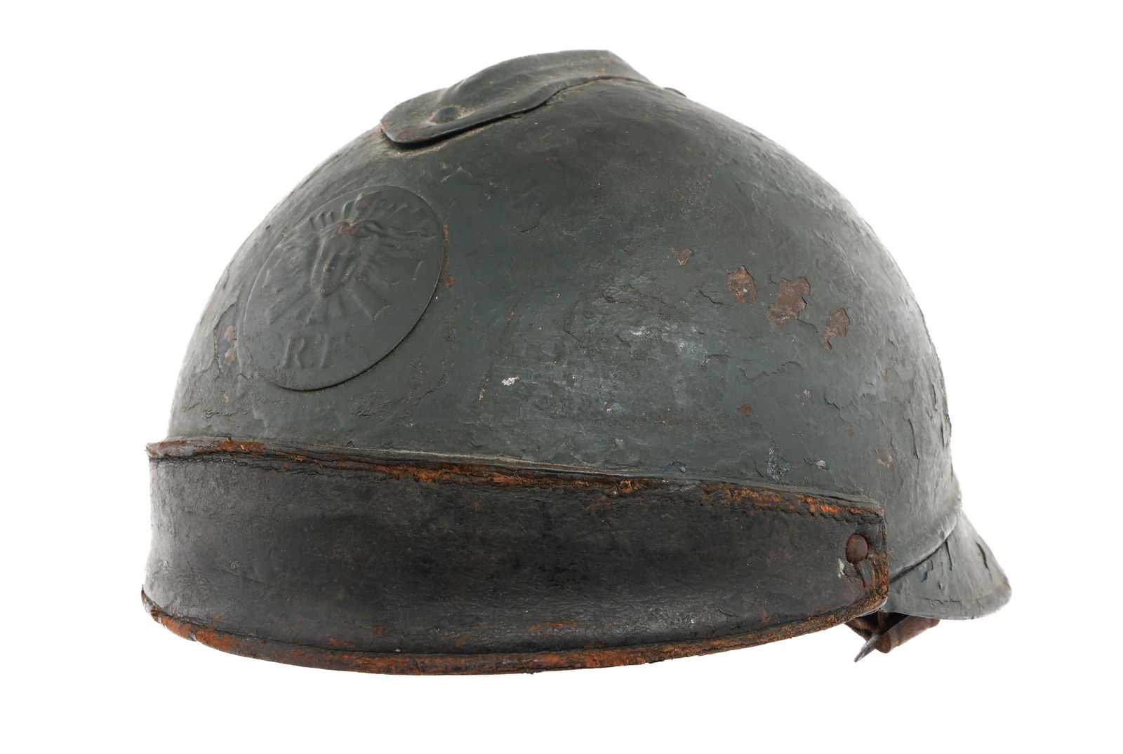 WWI FRENCH TANKER MODIFIED M15 HELMET: WWI FRENCH TANKER MODIFIED M15 HELMET WWI French Tanker Modified M15 Adrian Helmet. Horizon blue painted shell with frontal Medusa Head badge and leather pad. Leather liner and chinstrap.