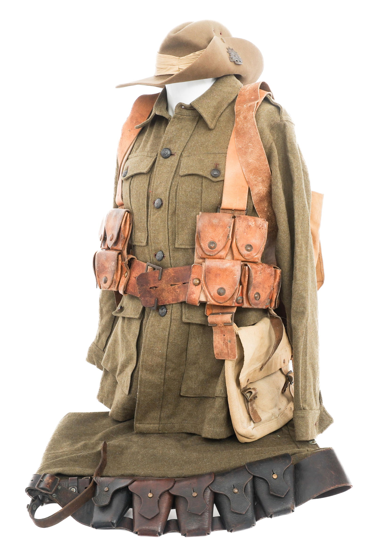 WWI AUSTRALIAN 29th BTN UNIFORM & FIELD GEAR SET: WWI AUSTRALIAN 29th BTN UNIFORM & FIELD GEAR SET WWI Australian 29th Battalion Uniform & Field Gear Set. (1) Australian Pattern Service Tunic. Olive drab wool construction. Australian Military Forces