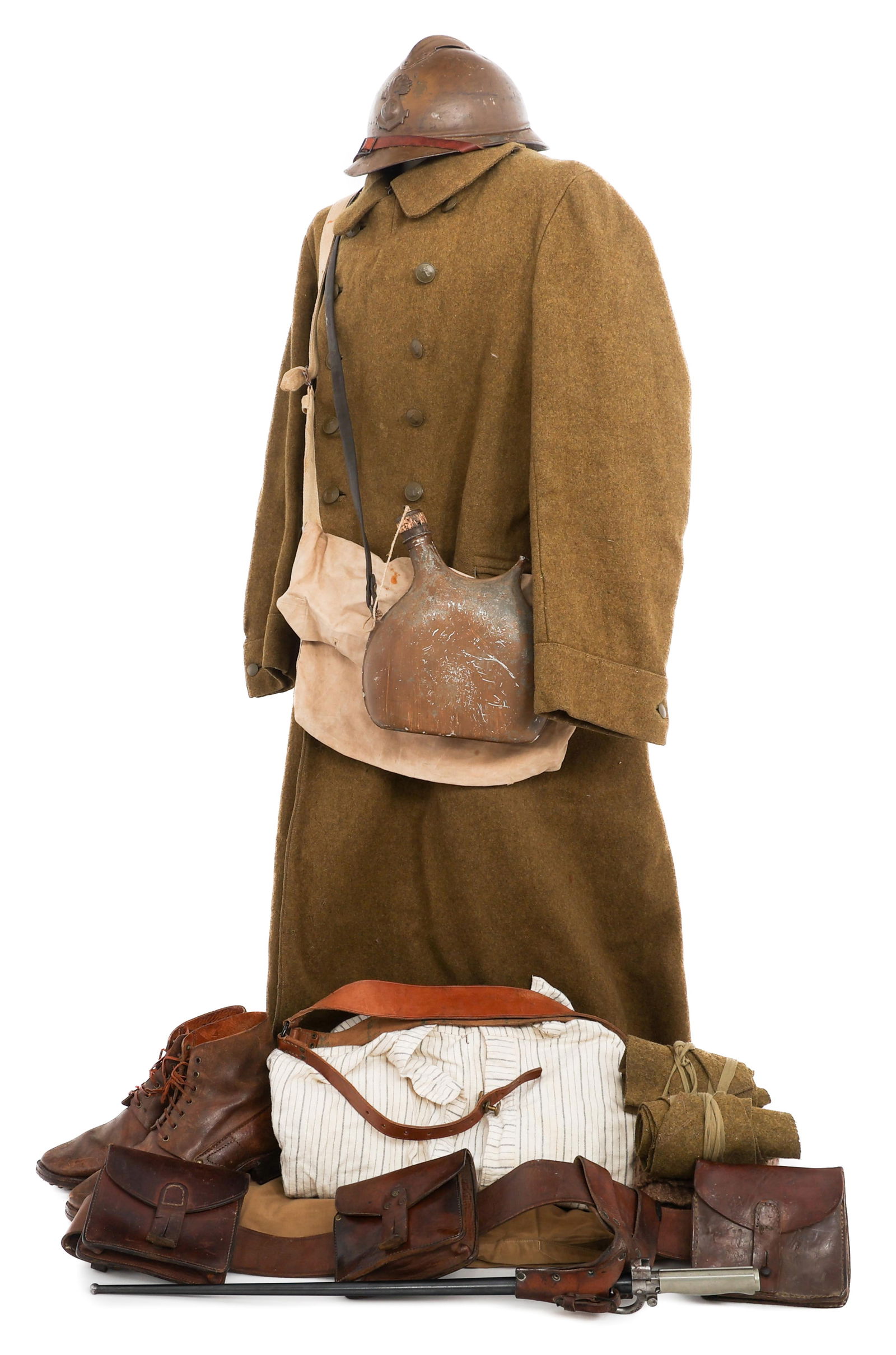 WWI - 1920s COLONIAL INFANTRY UNIFORM & GEAR SET: WWI - 1920s COLONIAL INFANTRY UNIFORM & GEAR SET WWI - Post War Colonial Infantry Uniform and Gear Set. (1) M1920 Greatcoat. Dark khaki, double breasted, wool coat with Colonial Infantry buttons. Ink