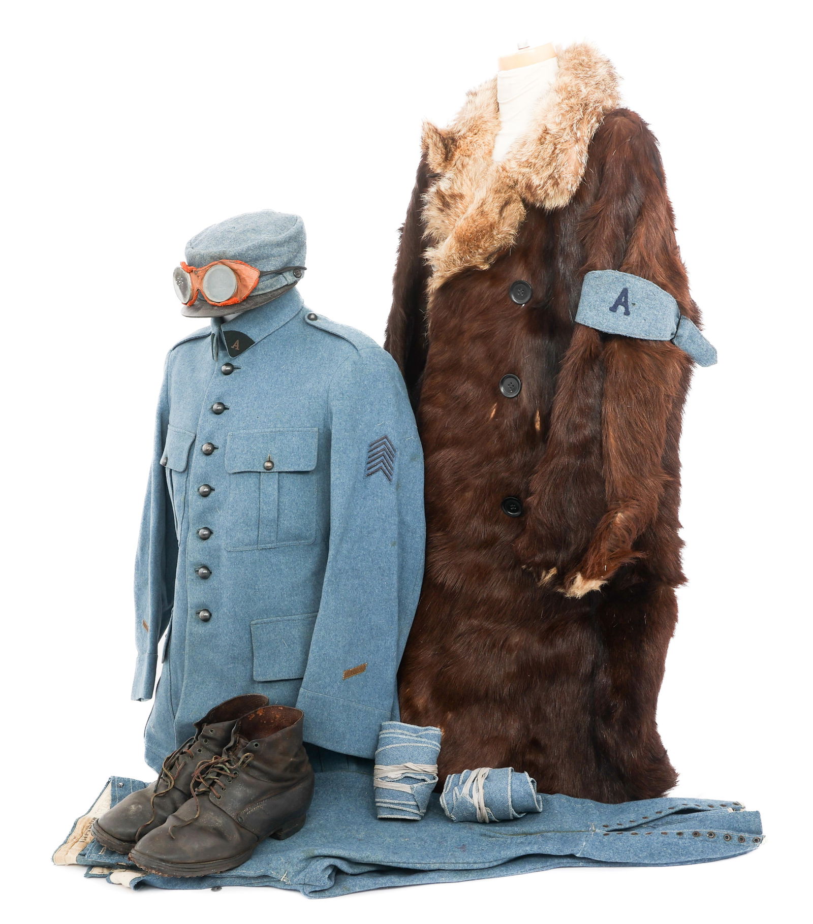 WWI FRENCH ARMY AUTOMOBILE DRIVER OFFICER UNIFORM: WWI FRENCH ARMY AUTOMOBILE DRIVER OFFICER UNIFORM WWI French Army Automobile Driver Officer Uniform. (1) Tunic. Horizon blue wool, four-pocket tunic with Automobile collar tabs, 2nd Lieutenant cuff ra