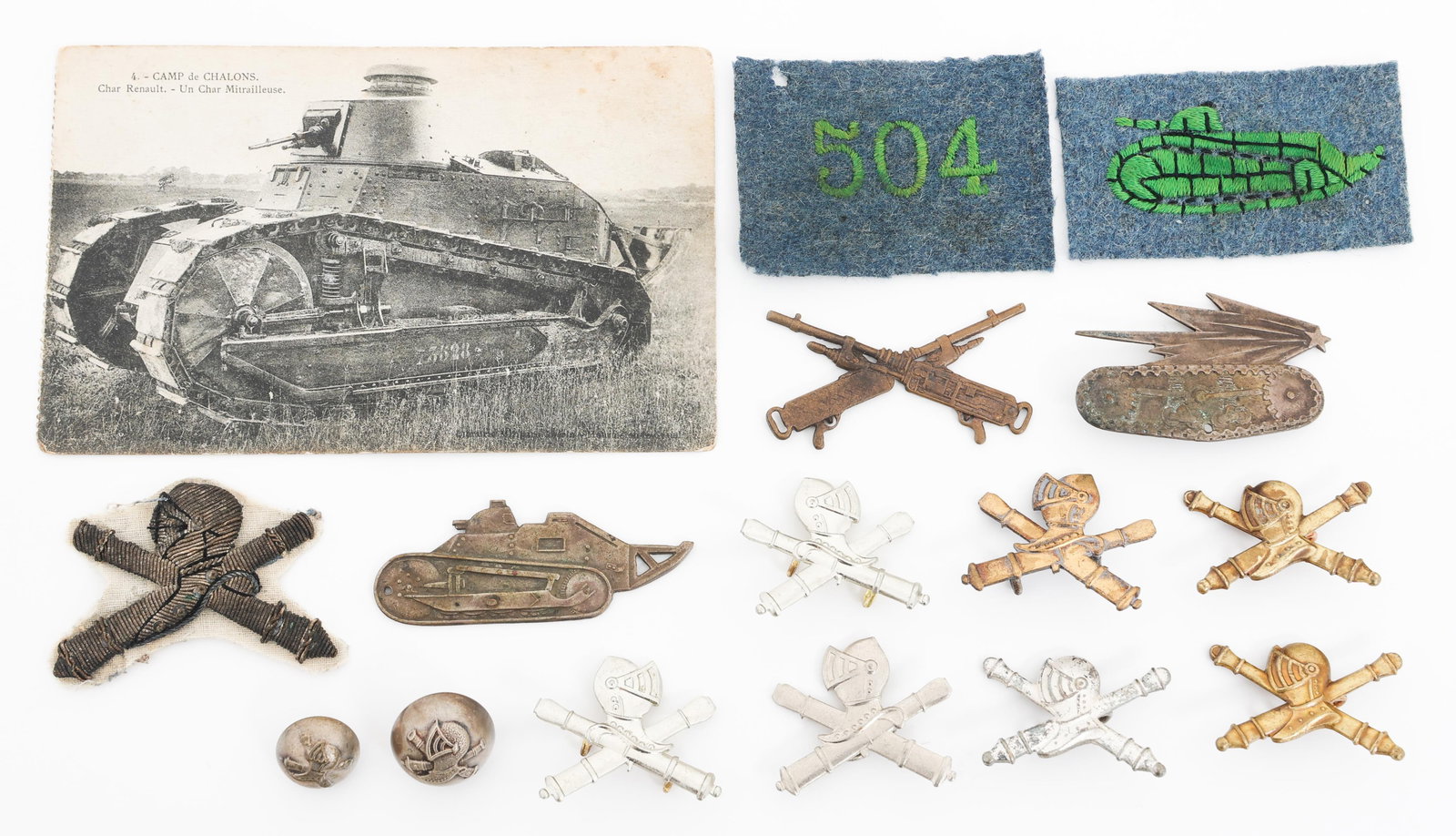 WWII FRENCH 504th TANK REGIMENT INSIGNIA: WWII FRENCH 504th TANK REGIMENT INSIGNIA WWII French 504th Tank Regiment Insignia. (3) Patches. One with bullion stitching. (2) Buttons. (1) Postcard. (10) Badges.