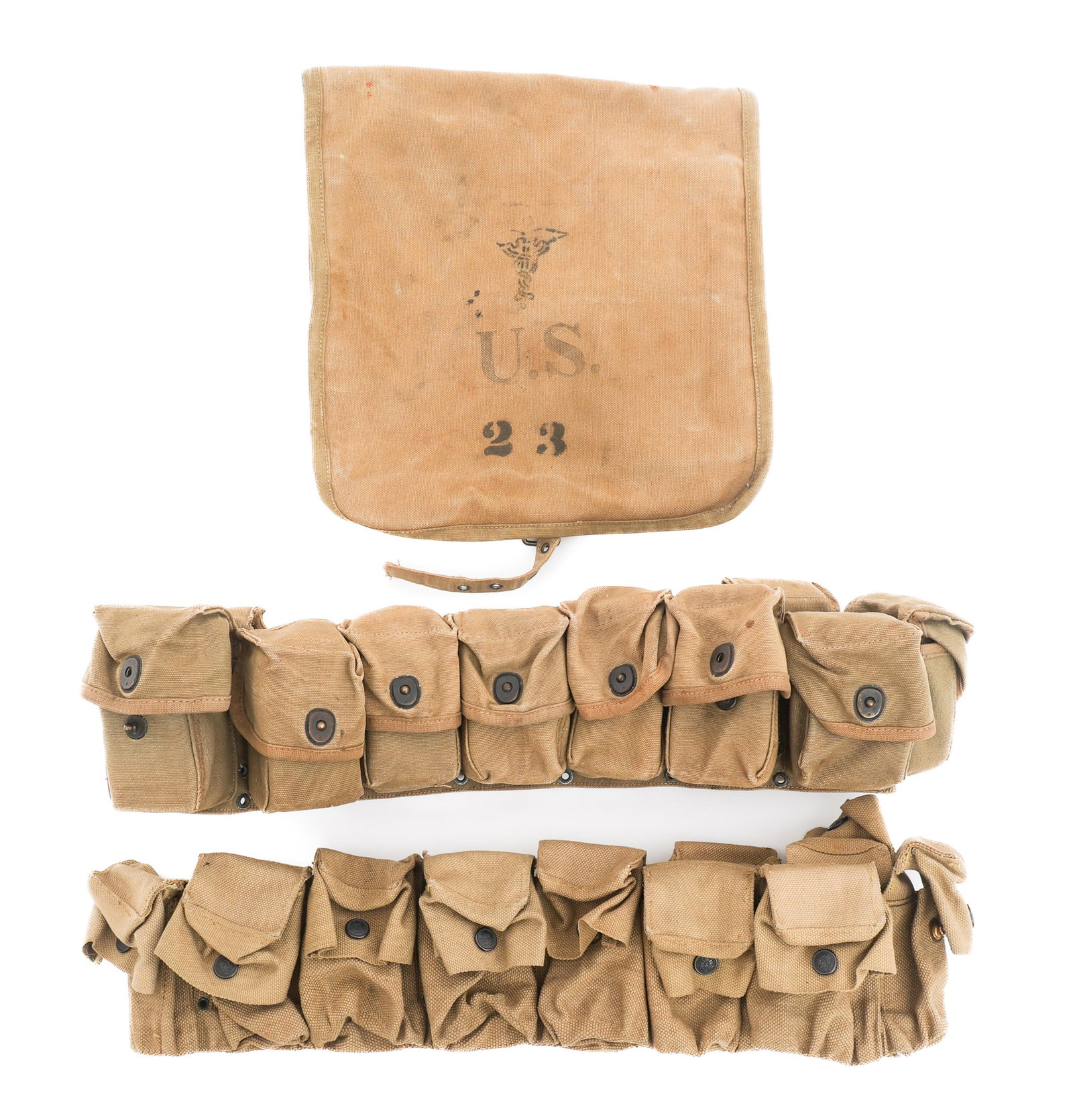 WWI US AEF M1910 MEDICAL BELTS & M1898 HAVERSACK: WWI US AEF M1910 MEDICAL BELTS & M1898 HAVERSACK WWI US AEF M1910 Medical Belts & M1898 Haversack. (1) M1910 Medical Belt with Rimmed Eagle Snaps. Maker marked by Mills & dated 1917. Holds a single fi