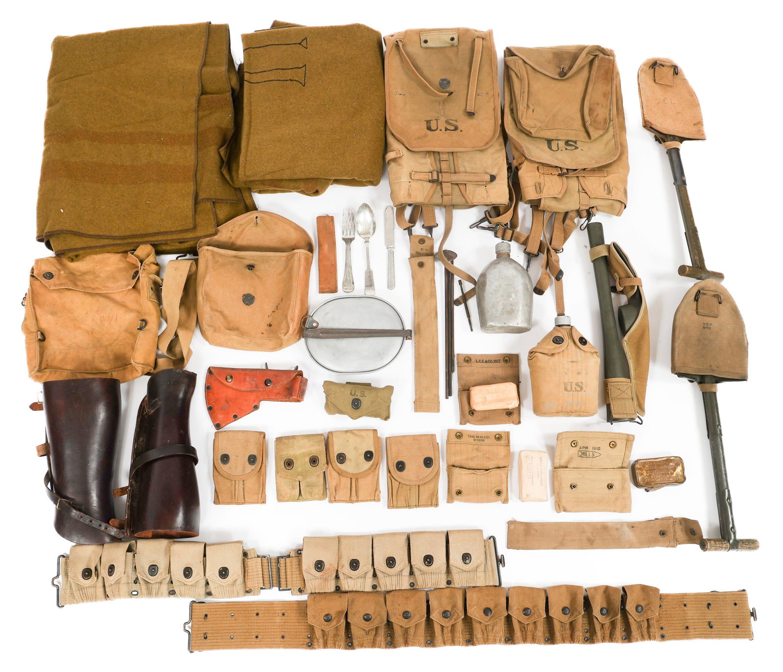 WWI US ARMED FORCES FIELD GEAR: WWI US ARMED FORCES FIELD GEAR WWI US Armed Forces Field Gear. Includes Cartridge Belt, Ammunition Pouches, Leather Gaiters, Pick Mattock, Canteens, T-handle Entrenching Tools, Mess Kits, Wool Blanket