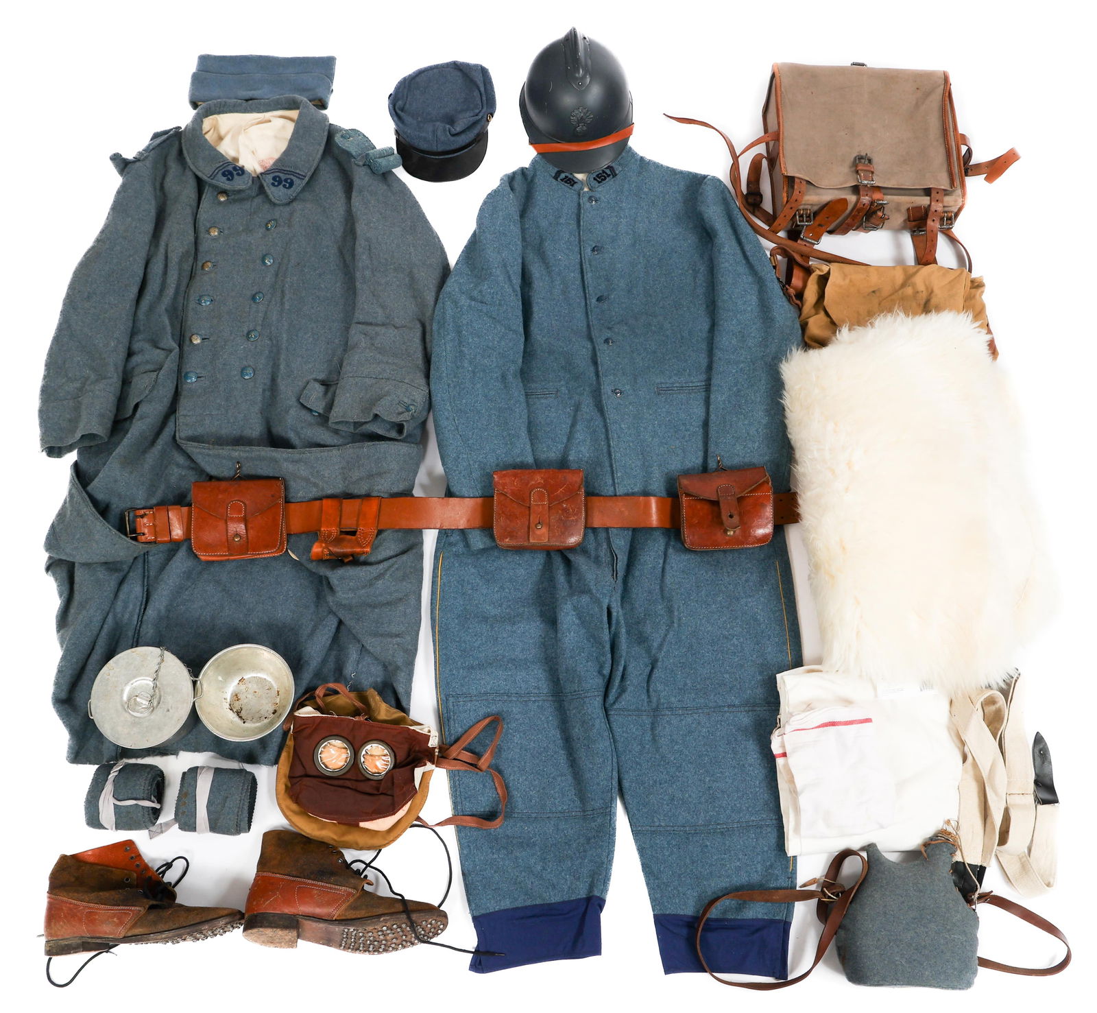 REENACTOR WWII FRENCH UNIFORM SET & ITEMS: REENACTOR WWII FRENCH UNIFORM SET & ITEMS Reenactor WWII French Uniform Set and Items. Includes Adrian Helmet, Kepi, Garrison Cap, Tornister, Overcoats, Legging Wraps, Hobnail Sole Boots, M1877 Cantee
