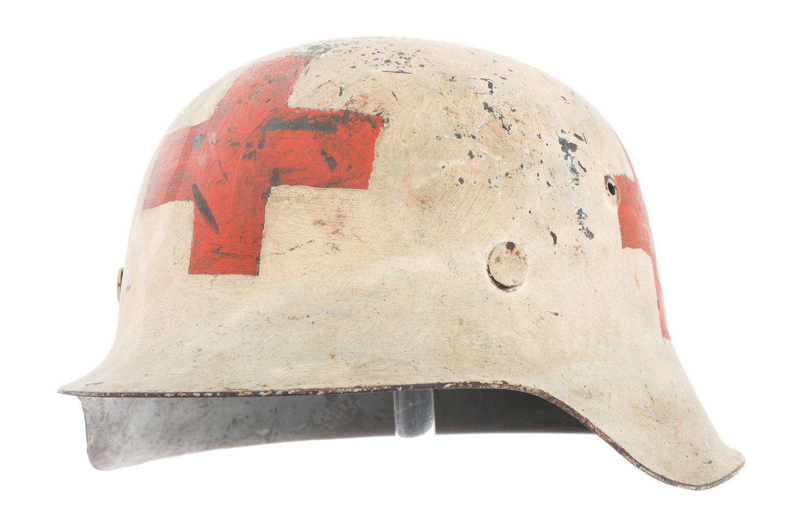 WWII GERMAN RED CROSS M42 COMBAT HELMET: WWII GERMAN RED CROSS M42 COMBAT HELMET WWII German Red Cross M42 Combat Helmet. Maker marked ET64 (Eisenh?ttenwerk AG, Thale Hartzuttenwerk AG, Thale Harz) stamped on the side and serial number 432 o