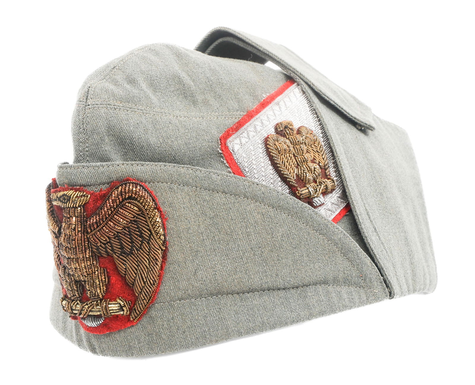 WWII ITALIAN MVSN GENERAL OFFICER BUSTINA CAP: WWII ITALIAN MVSN GENERAL OFFICER BUSTINA CAP WWII Fascist Italian MVSN General Officer Bustina Cap. Grey fine wool construction with bullion eagle holding fasces badge and rank insignia. Leather swea